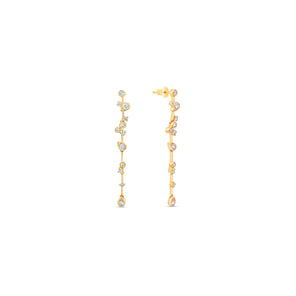 Gold earrings with small diamonds on a white background