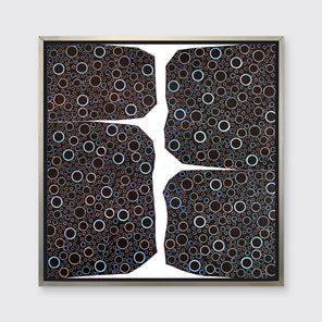 A multicolored abstract print in a silver floater frame hangs on a white wall.