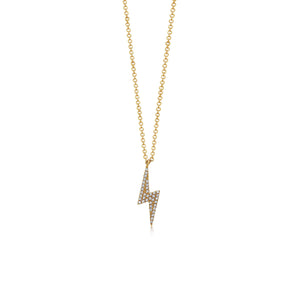 Gold necklace with a lightning bolt pendant on a white background