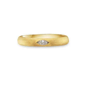 Gold ring with a diamond on a white background