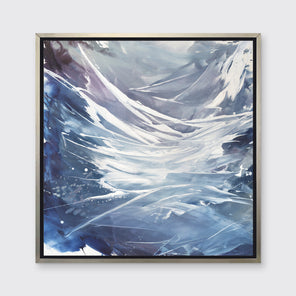 A light purple, grey, white and blue abstract print in a silver floater frame hangs on a white wall.