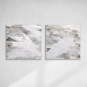 Two original paintings featuring abstract grey tones with a bird (owl) motif, displayed horizontally hanging on a wall.