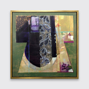 A green, gold and black abstract print in a gold floater frame hangs on a white wall.