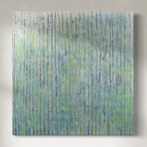 A painting with purple and green undertones and striated with silver lines hangs on a gallery wall. 