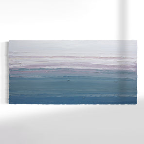 A white, lavender, teal and blue abstract heavily textured painting like sculpture by Teodora Guererra hanging on a white wall.
