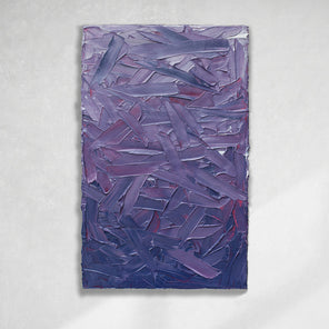 A tonal purple and pink thickly textured abstract painting by Teodora Guererra hangs on a white wall.