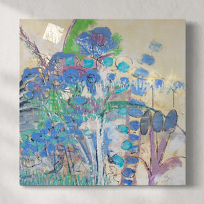 A blue and green abstracted encaustic painting hangs on a white wall.