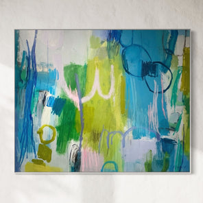 Abstract painting with blue, green, and yellow colors on a white wall.